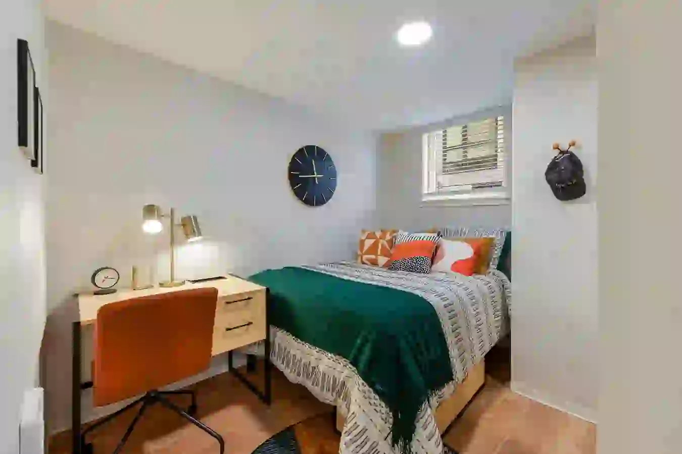 Under-bed storage and private desks included